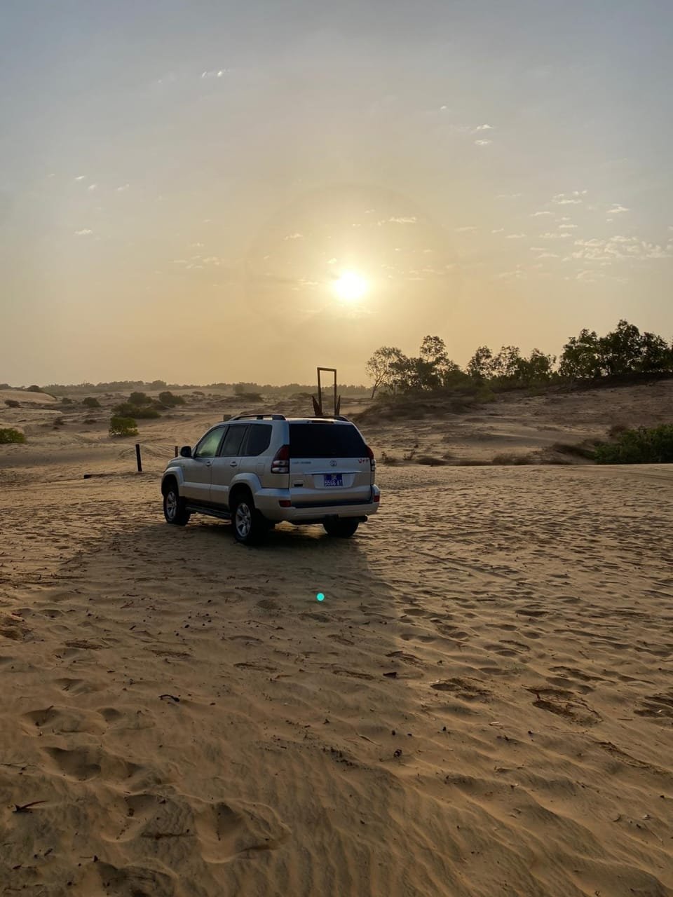 4x4 dans le désert de Lompoul au coucher du soleil